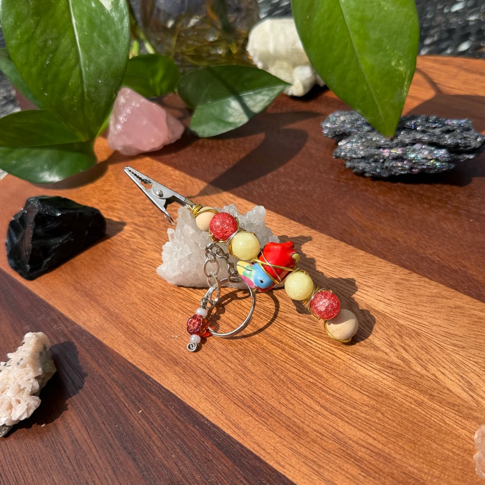 Image of rainbow macaw clip keychain