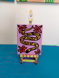 Image 3 of Snake in the Flowers