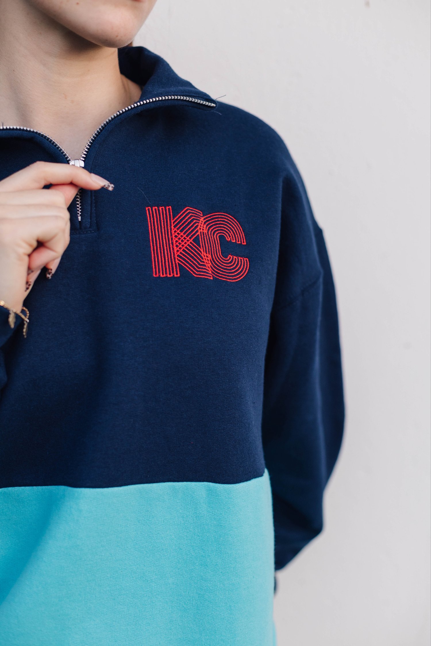 Image of KC's MAKING GROOVES TEAL/NAVY/RED QUARTER-ZIP SWEATSHIRT 