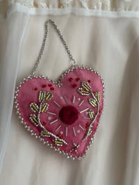 Image 2 of Held Rose Wall Hanging