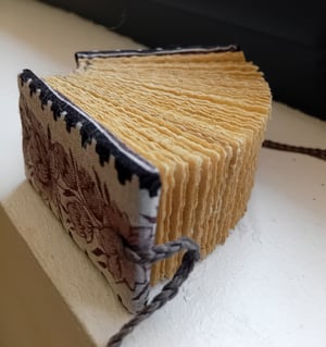 RENNALA — mini livre — reliure copte