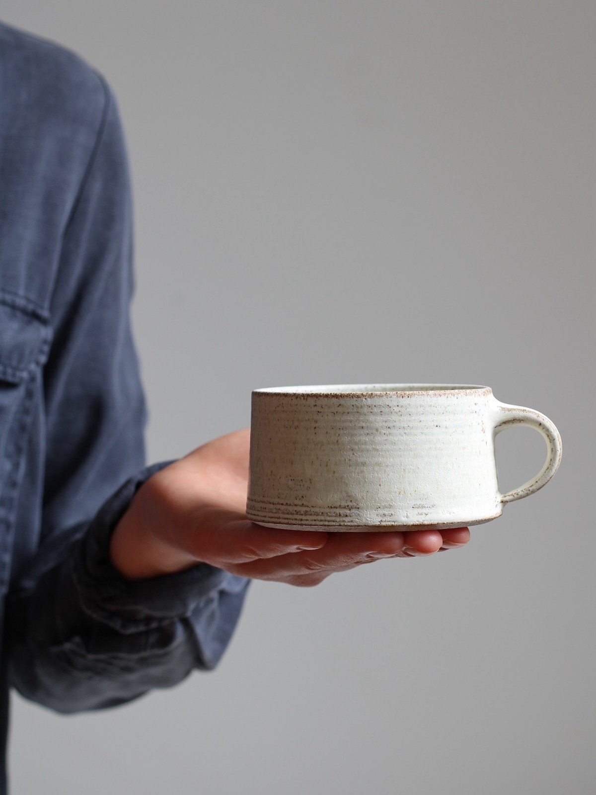 Image of simple mug in textured dune