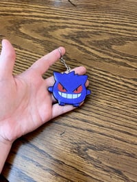 Image 2 of Grinning Shadow Resin Keychain