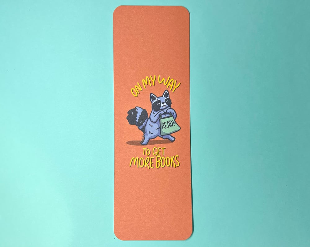 Image of Reading raccoon bookmark
