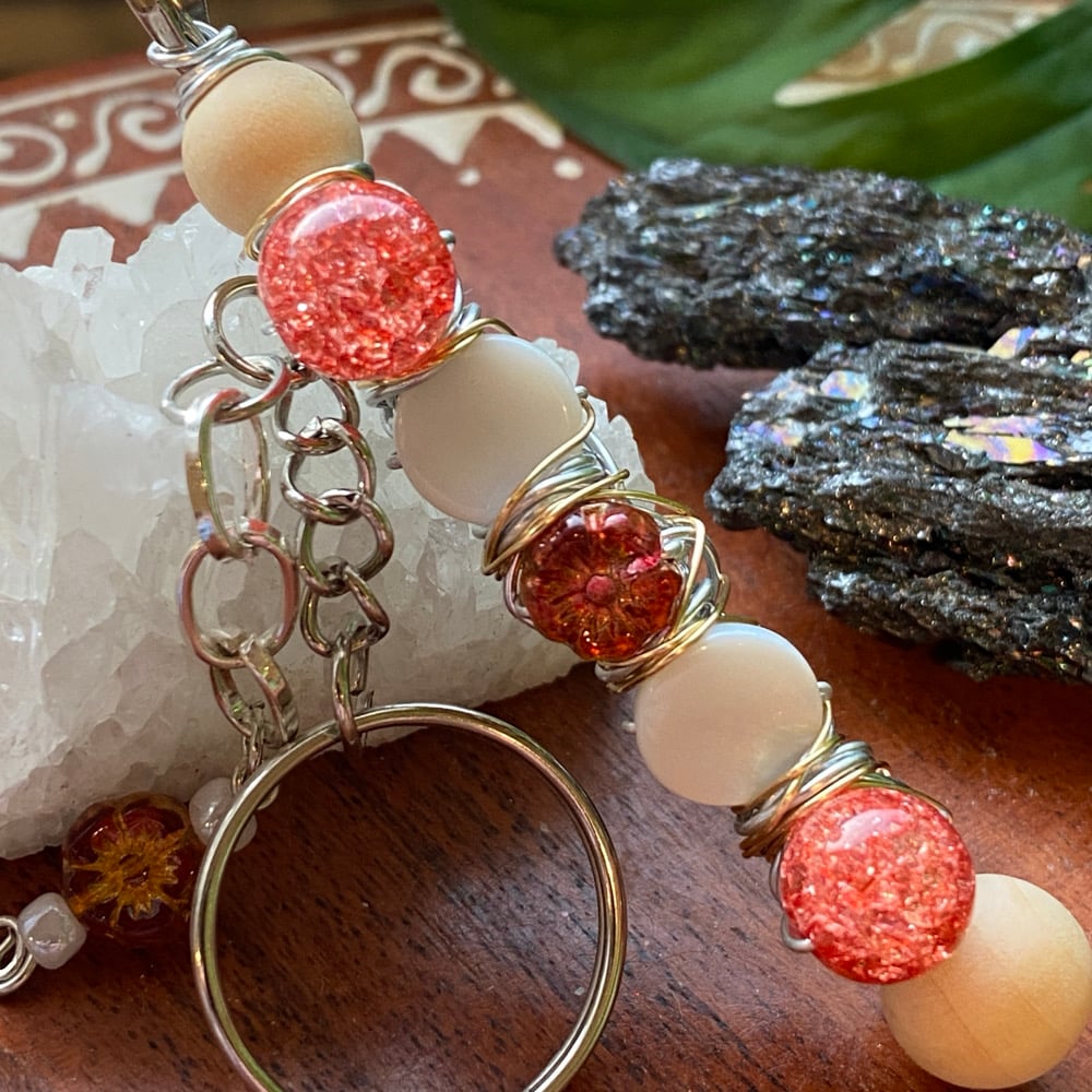 Image of red hibiscus clip keychain 