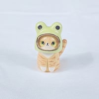 Image 1 of Orange cat with frog hat ceramic figurine