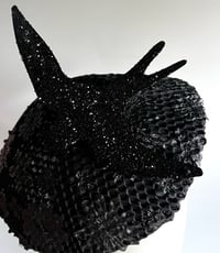 Image 2 of Black disc with white bird