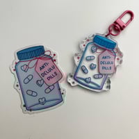 Anti Delulu Keychain & Sticker