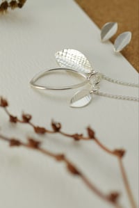 Image 4 of Triple-Leaf Family Pendant in Recycled Silver – Customisable Fold Collection Necklace