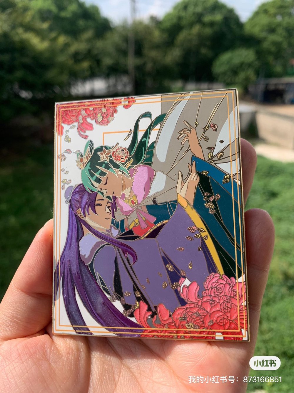 Image of JINSHI AND MAOMAO IN HAND