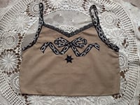 Image 1 of chain bow top