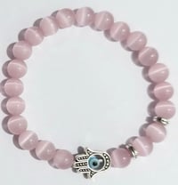 Image 2 of Heart Shield Bracelet: Pink Cat Eye Quartz + Hamsa Hand