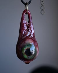 Image 1 of Dripping Eye, Green Glow in the dark, Flash reflective pupil