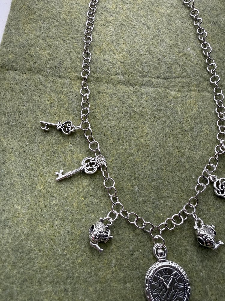 Image of Alice in wonderland inspired necklace ❣️🕰️🫖🐇