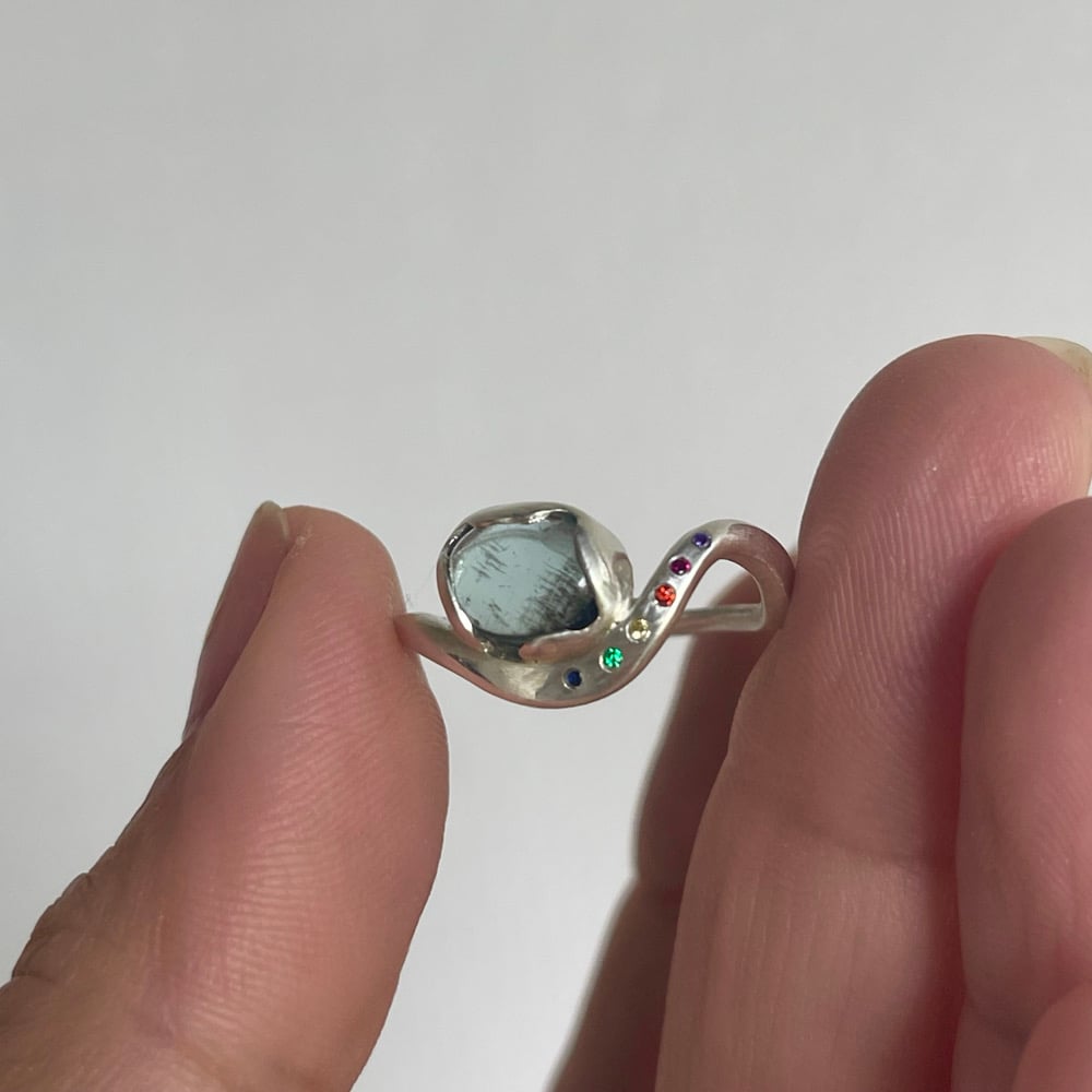 Image of Blue wave and rainbow ring