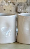 Pair of Cream Dimpled Cylinders 