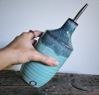 Image 1 of Oil Pourer in OCEAN