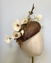 Image 1 of Brown parisisal face hugger