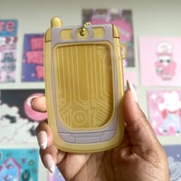 Image 4 of nova 710 flip phone pc holders. 