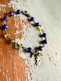 Image 11 of lapis and peridot charm bracelet