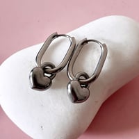 Image 4 of Oval Huggie Hoops with Lock Heart