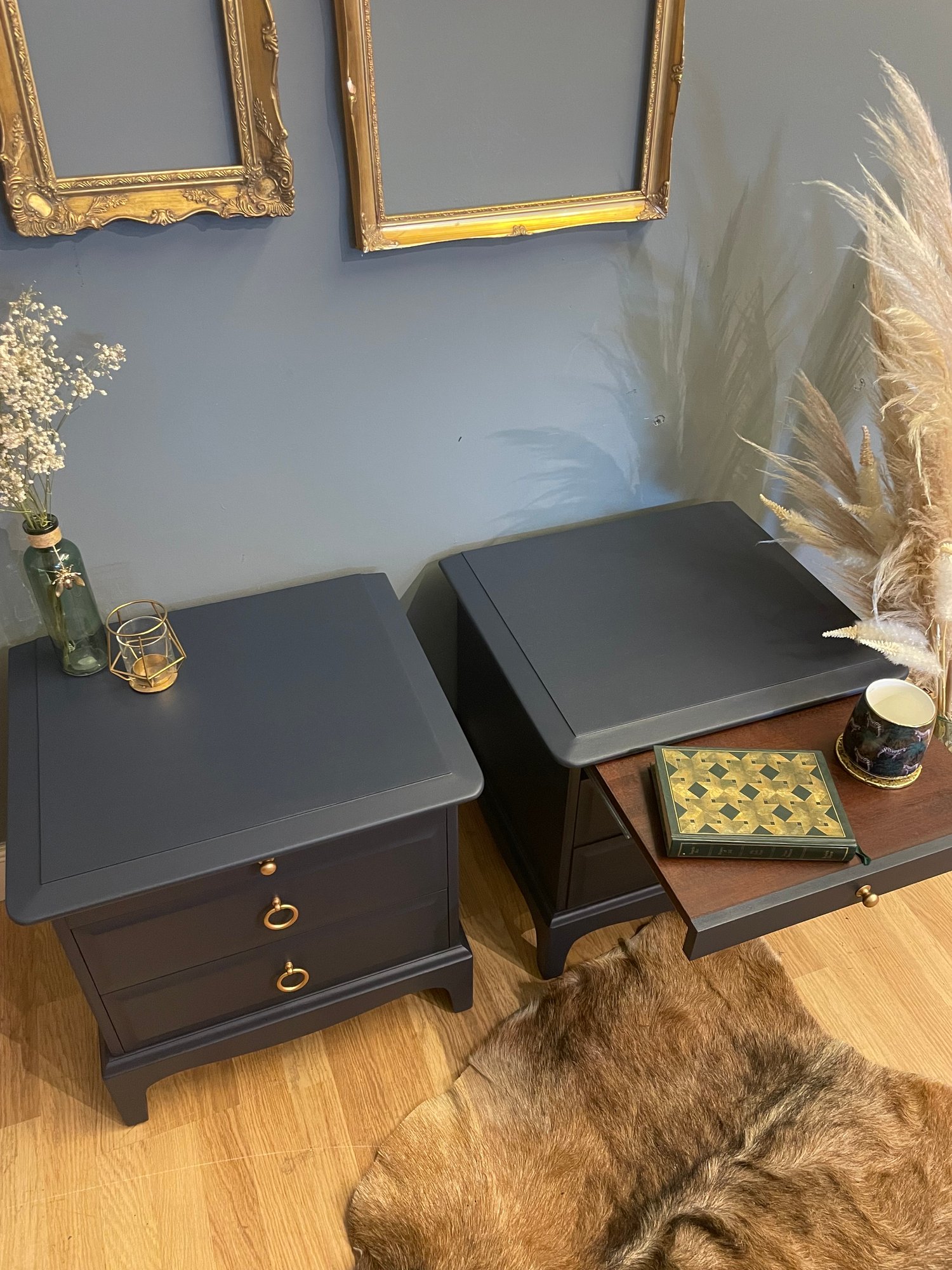 Image of Dark blue stag bedside tables 