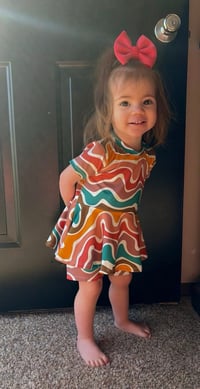 Image 1 of Stay Wild Peplum (size 6,7,8)