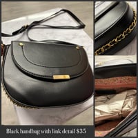 Black handbag with link detail 