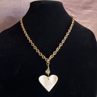 Image 1 of pink conch heart on gold chain