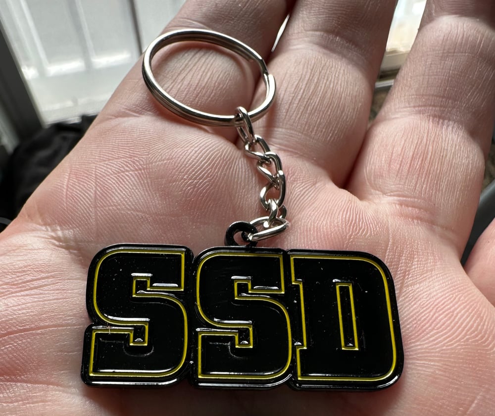 SSD logo Black Outline metal keychain 