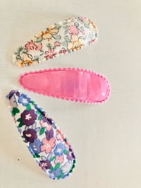 Image 1 of Covered snap clips 