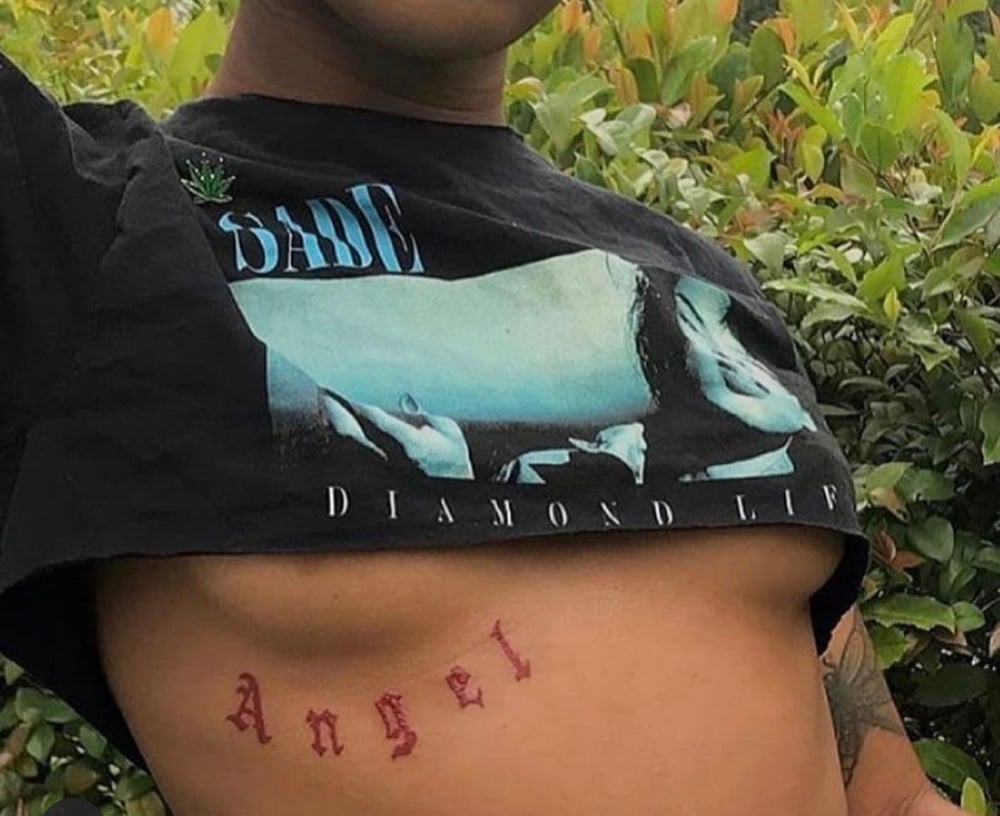 T.O.T Angel underboob tattoo 