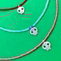 Image 3 of Dia de los Muertos tiny skulls necklaces
