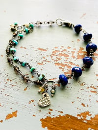 Image 1 of wire wrapped lapis lazuli and turquoise charm bracelet 