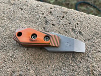 Orange and black g10 pry