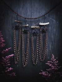 Image 1 of duo moon chandeliers