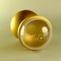 Image 3 of metal capsule (gold brick)