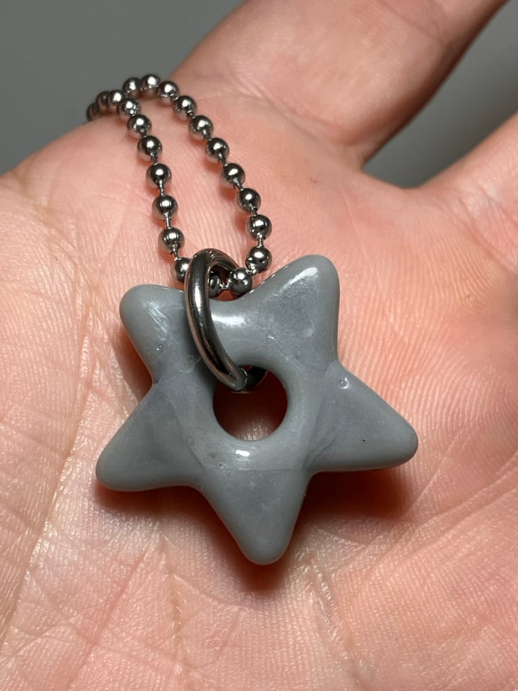 Image of mini light grey star 