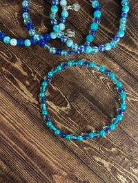 Image 6 of Star Shine Sea Glass Aura Blue and Teal Tumbler Bracelet Stack