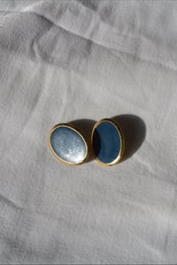 Image 1 of aqua studs 