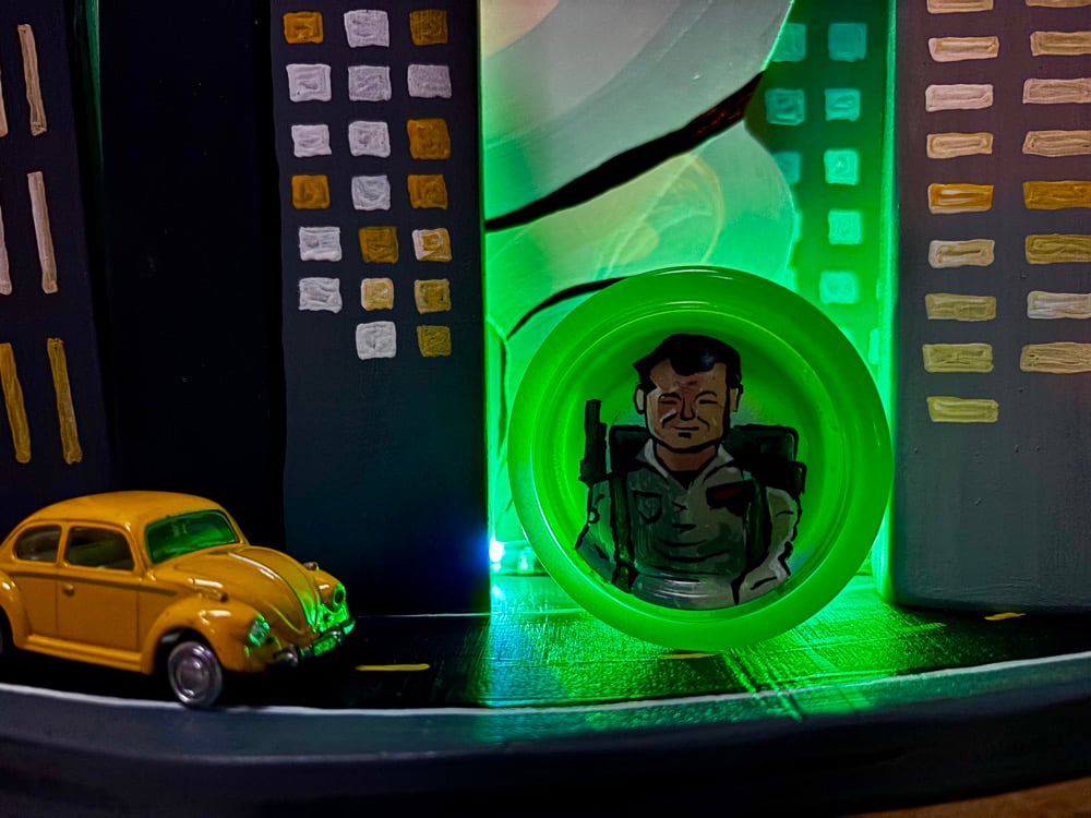 Image of Ghostbusters Duncan GLOW Freehand One with Stay Puft City Display