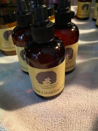 Image 1 of Hair growing oil 4oz 