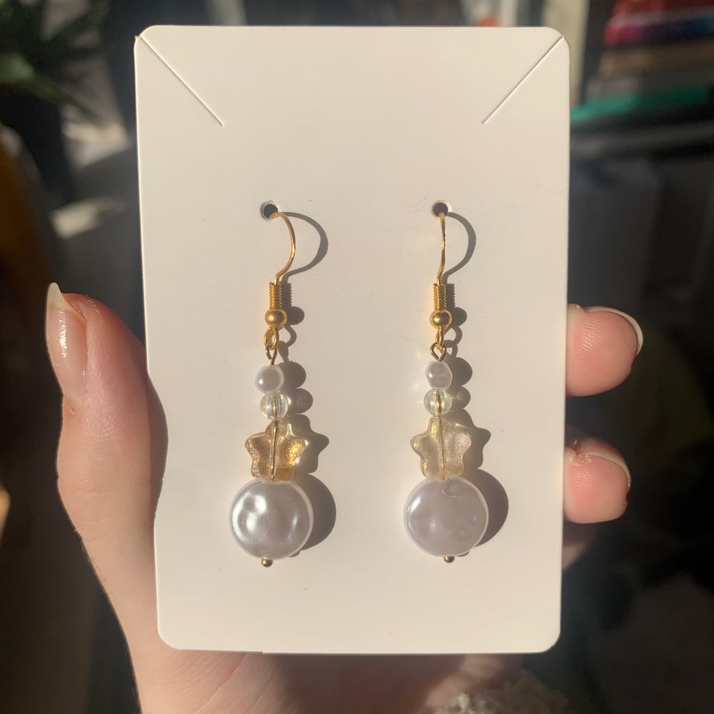 Image of star and moon bead earrings
