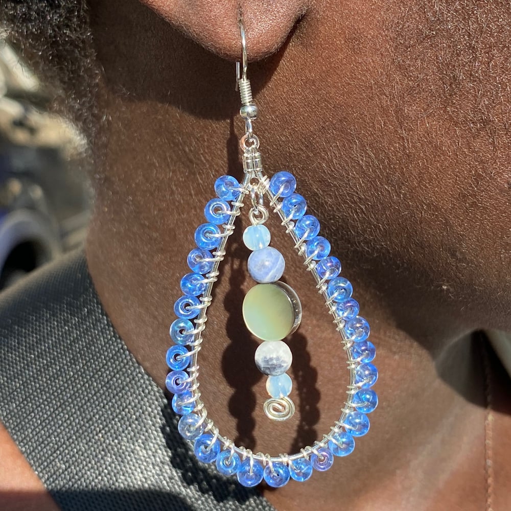 Image of clear sky earrings 
