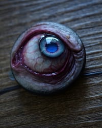 Image 11 of Custom Swappable Phone Grip for smartphones, bright blue reflective pupil, glow in the dark 