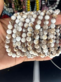 Brown and white bracelet 