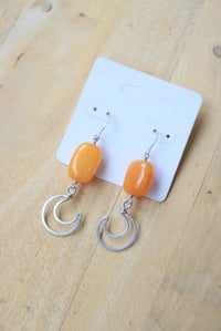 Image 2 of Silver Moon + Orange Crystal Earrings