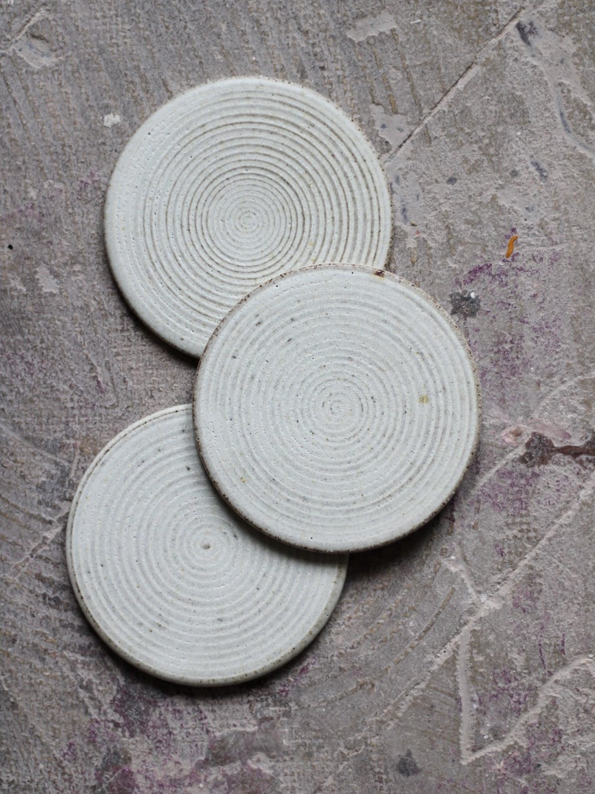 Image of coaster in textured ivory