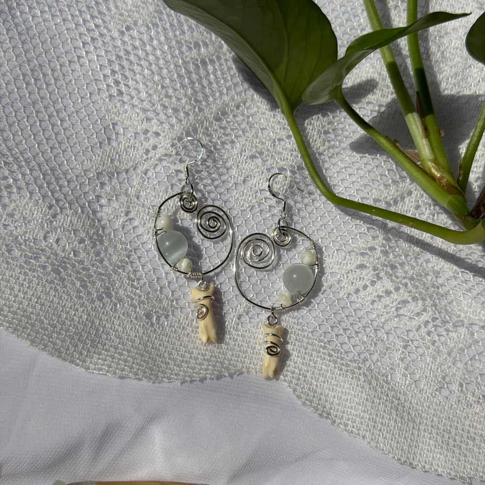Image of cloud bone earrings