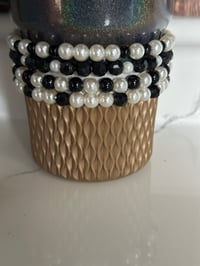 Image 3 of Wild Blooms Black, Gold, and Cream Tumbler Bracelet Stack